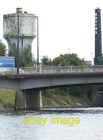 Photo 6x4 Roadbridge crosses the Taff Cardiff/Caerdydd With water tower  c2007