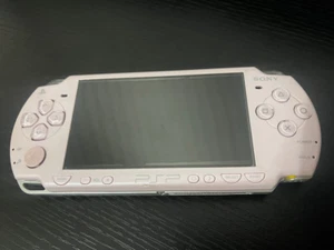 Sony PSP 2000 Slim rosafarbenes Handheld-System Beschreibung lesen - Bild 1 von 11