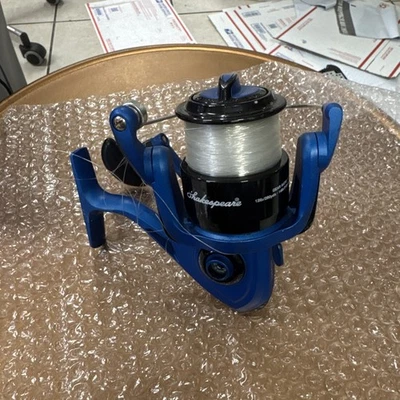 Carrete de pesca giratorio Tiger Shakespeare Tgra50 azul negro 5,1:1 relación de transmisión izquierda Foto 1 de 4