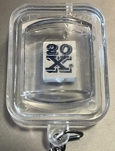 Frasco llavero plástico vintage Wrangler Jeans “20X” con 20X azulejo con agua evaporada - Imagen 1 de 3