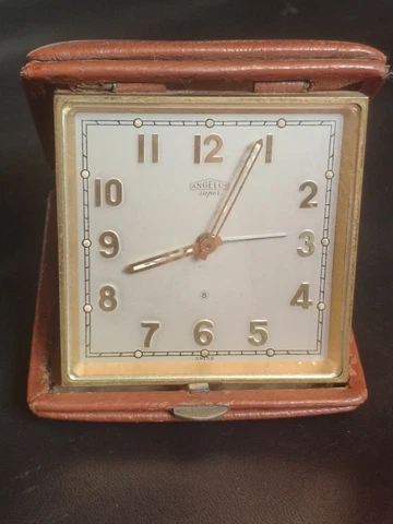Vintage Angelus Super 8 days travel alarm clock runs for repair Cover