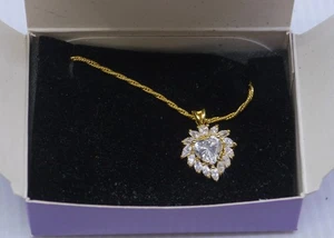 ELIZABETH TAYLOR RADIANCE NECKLACE FOR AVON, CZ HEART PENDANT, GOLD  TONE CHAIN - Picture 1 of 9