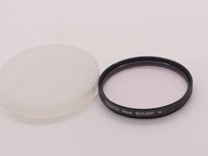 CANON 58MM SKYLIGHT FILTER SLIGHT MARK 145 - Picture 1 of 2