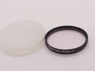 CANON 58MM SKYLIGHT FILTER SLIGHT MARK 145 - Image 1 of 2