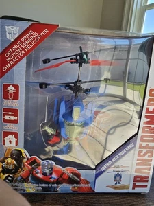 World Tech Toys: Transformer Optimus Prime Motion Sensing Helicopter  NEW IN BOX - Picture 1 of 2
