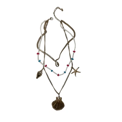 Collar con dije de playa en capas tono dorado estrella de mar caracola cuentas aprox. 18" Usado en Excelente Condición Foto 1 de 3