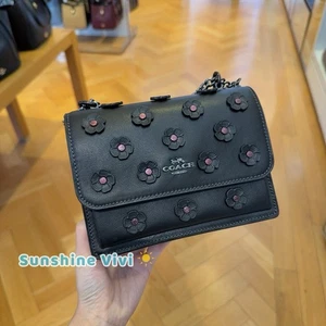 Neu mit Etikett Coach Mini Klare Umhängetasche mit Blumenapplikation CAK00 metallisch/schwarz - Bild 1 von 5