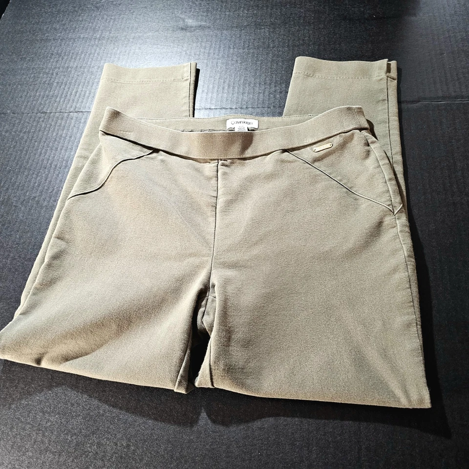 Calvin Klein 女式裤子中号军装卡其色弹力紧身裤二手状况完好 — 第 1/4 张图片
