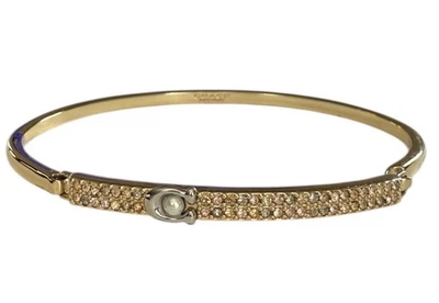 Brazalete Brazalete COACH Legacy Tono Dorado Bisagra Logo C Perla Simulada/Estrás Foto 1 de 4