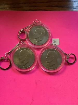 Junk Drawer Lot 3 Eisenhower Silver Type Dollars Ike Keychains Coin Sets Look - Image 1 of 3