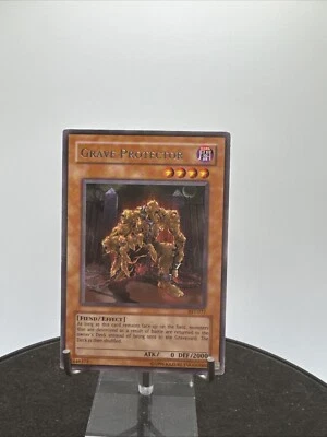 2004 Yu-Gi-Oh! - Ancient Sanctuary Unlimited Grave Protector # AST-077 gl9 - Image 1 of 4