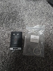 OEM Cadillac Smart Key Fob with 5 Buttons Uncut - Picture 1 of 5