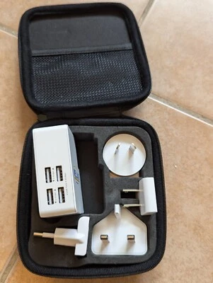 Cargador de viaje USB de 4 puertos por todo el mundo Foto 1 de 3