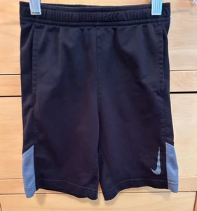 boy's Nike shorts, black with gray accents, with pockets size 7/L, athletic - Picture 1 of 2