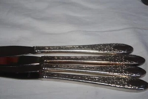 NATIONAL PLATEADO CO. VAJILLA PLATEADA ""ROSA Y HOJA"" (4) CUCHILLOS DE CENA - Imagen 1 de 3