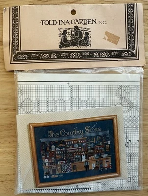 Told In A Garden The Country Store Cross Stitch Pattern w Fabric New Vtg - Image 1 of 4