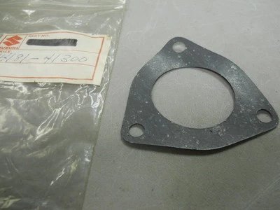 Junta, tubo de escape 14181-41300 Suzuki NOS RM100B, RM125A, 1976-1978.  S70 Foto 1 de 3