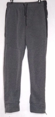 Pantalones RBX para mujer ropa deportiva talla mediana con puños gris oscuro mezcla de algodón cremalleras Foto 1 de 4