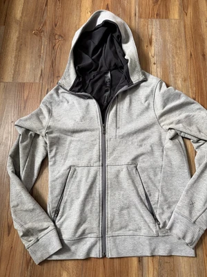 Chaqueta con capucha gris pequeña con cremallera Lululemon para hombre Foto 1 de 4