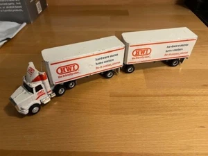 ERTL 1/64 scale Volvo Semi with two pup trailers - Picture 1 of 4