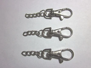 Lote de 100 50 25 CLIPS GIRATORIOS DE METAL ~ GANCHOS A PRESIÓN 1,5"" con cadena de 1"" (39mmx18mm) - Imagen 1 de 1
