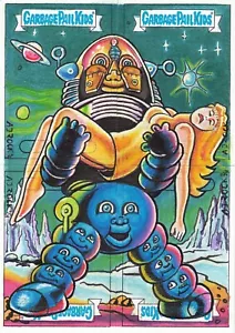 2023 GARBAGE PAIL KIDS INTERGOOLACTIC CAOS CARGADO ROMPECABEZAS BOCETO TARJETA ANUNCIO ROCK - Imagen 1 de 2