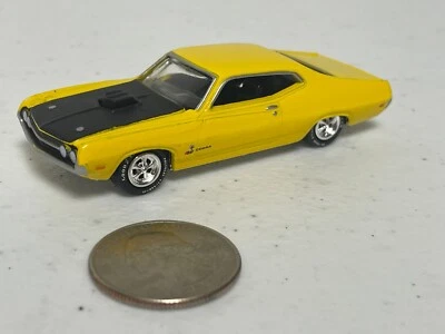 Ford Torino Cobra 1970 amarillo Johnny Lightning - neumáticos de goma 1/64 Foto 1 de 4