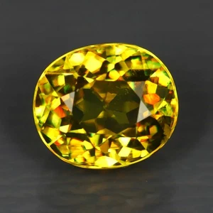 2.00 ct Oval Cut (7 x 6mm) Pakistan Multi Color Flashing Natural Sphene Gemstone - Picture 1 of 2