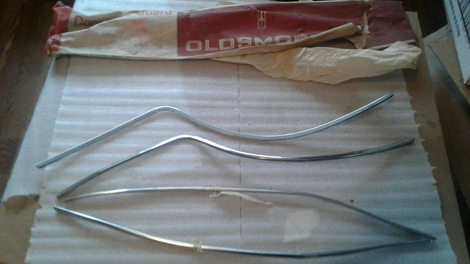 NOS 1964 Oldsmobile F-85 4-door Door Edge Guards 982312 - Image 1 of 1