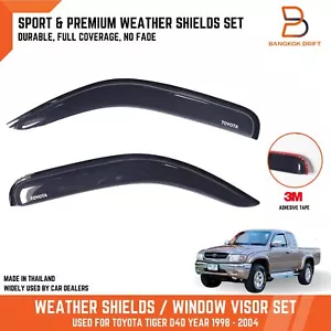 2 PUERTAS ESCUDO METEOROLÓGICO VISERA DE VENTANA PROTECTOR CONTRA LA LLUVIA PARA TOYOTA HILUX 97-04 CABINA ÚNICA - Imagen 1 de 6