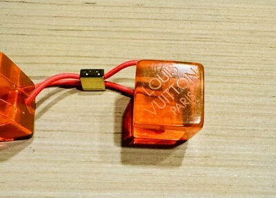 Authentic Louis Vuitton hair cube clear Translucent orange Pink hair elastic - Image 1 of 4