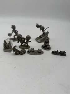 Lote De 8 Figuras De Peltre Pequeñas De Colección Gatos, Conejos, Esquiadores, Niños, Religiosos - Imagen 1 de 12