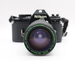 Nikon EM SLR 35mm fotocamera pellicola con obiettivo Quantaray 28-80mm - ottime condizioni - Foto 1 di 14