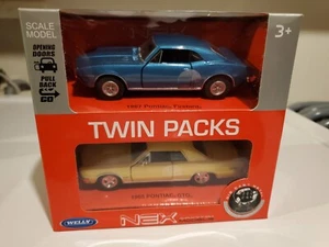 Welly Die Cast 1:43 Twin Pack NEX 1967 Pontiac Firebird / 1965 Pontiac GTO  - Bild 1 von 1