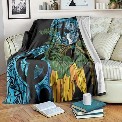 Türkisfarbene Neuseeland-Decke mit Kowhai- und Piwakawaka-Motiv Maori Ngaru Paua - Bild 1 von 4