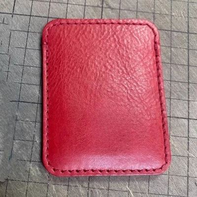Bolsa de almacenamiento de viaje protectora de cuero genuino roja de lujo 83x63 mm para SSD HP P900 Foto 1 de 4