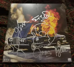PORTUGAL THE MAN signed auto WOODSTOCK Vinyl LP Feel It Still PROOF GRAMMY 2018 - Picture 1 of 6