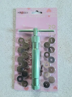 Extrusora de pasta de azúcar o arcilla polimérica sin estrenar nueva en paquete Foto 1 de 4