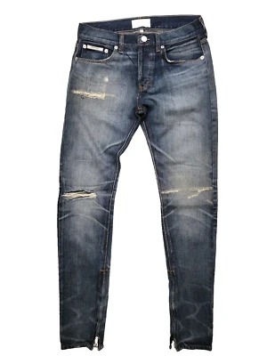 Pantalones de mezclilla para hombre FOG Fear of God Essentials azul desgastado parche botón 30x31 Foto 1 de 4