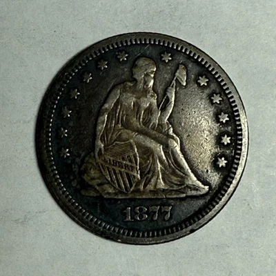 Cuarto de dólar de plata 1877 XF LIBERTAD SENTADA. Ficha de amor con LEY, LWA o AWL #q Foto 1 de 2