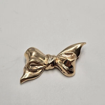 Broche broche lazo vintage de oro amarillo de 14 quilates de Tiffany & Co. Foto 1 de 4