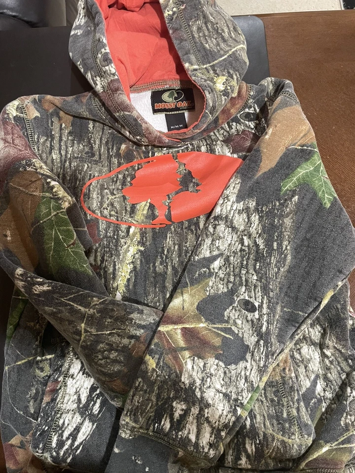 Boys Mossy Oak Hoodie size medium. Orange / camoflauge - Image 1 of 1