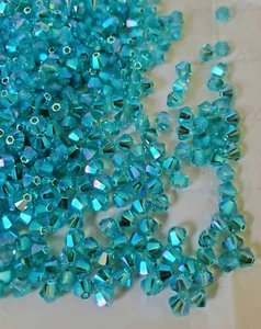 Swarovski Crystal 5328 4mm bicone beads, Light Turquoise AB2X (36 pcs) - Picture 1 of 3