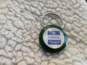 Vintage MOPAR-CHRYSLER-PLYMOUTH dealer Key Fob HARVEY IL *NOS* GREEN - Picture 1 of 2