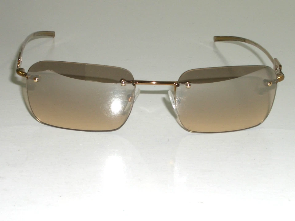 GAFAS DE SOL GUCCI ITALY GG1777/STRASS 51[]18-135 MARRÓN ELEGANTES RECTANGULARES SIN MONTURA Foto 1 de 4