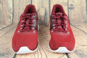 nike tanjun black and red