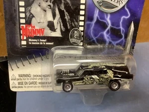 J L HAULIN HEARSE CADILLAC the mummy Disney set exclusive JOHNNY LIGHTNING  1:64 - Picture 1 of 2