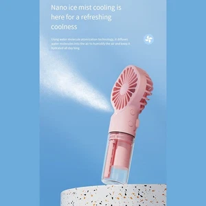 Compact Handheld Fan with Misting Spray Rechargeable Stay Cool Outdoors - Zdjęcie 1 z 6