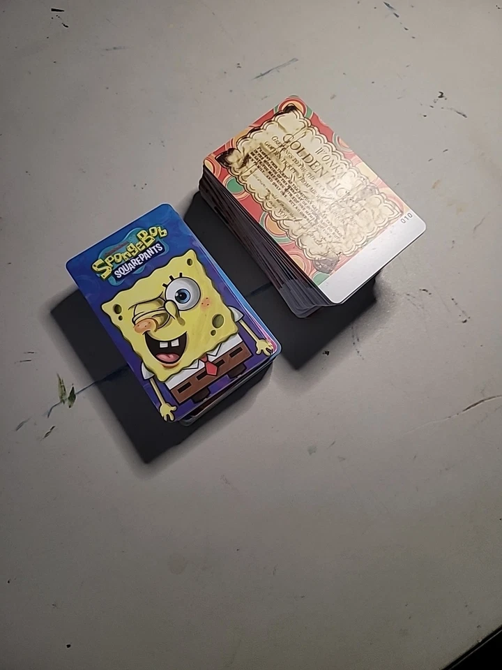 Tarjetas Willy Wonka más Bob Esponja monedas tarjetas de empuje dobles incompletas Foto 1 de 1