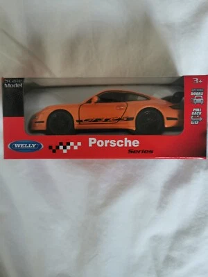 Modellino Statico Porsche GT3 RS Welly Auto Colore Arancione Scala 1:39 - Immagine 1 di 3